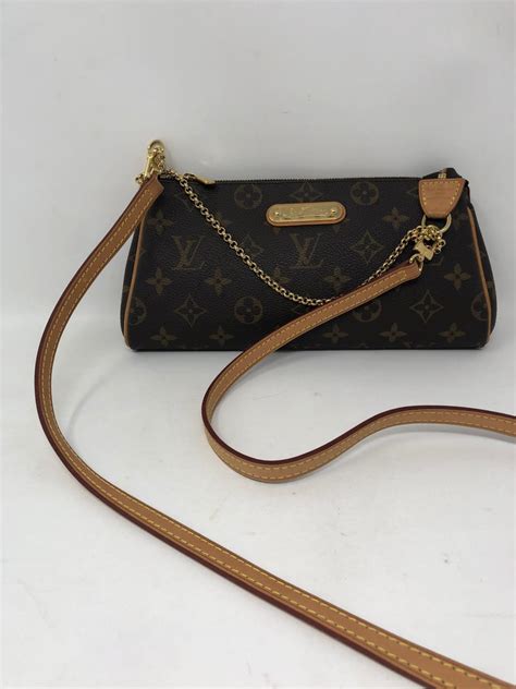 louis vuitton clutch long strap|louis vuitton used clutch.